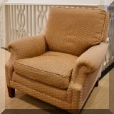 F43. Custom club chair with tan Brunschwig & Fils fabric. 34”h x 35”w x 36”d 